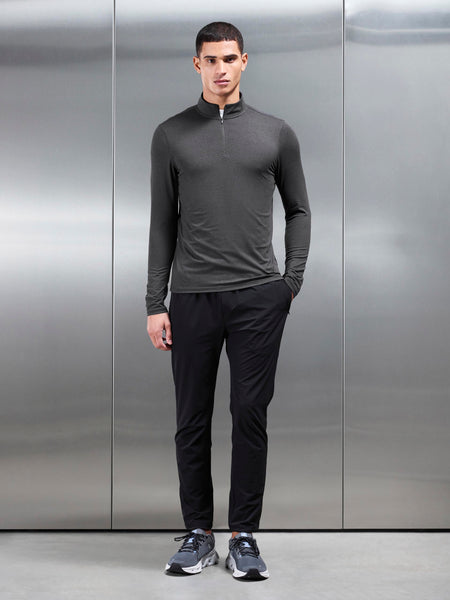SOFTJERSEYMOTIONHALFZIPINCHARCOAL_383_d1656082-adb7-47f7-af68-68289dc29526_600x600.jpg