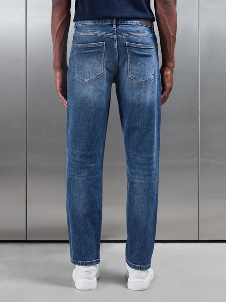 STRAIGHTLEGDENIMJEANSINMIDBLUE_18_6f4725f9-961c-4337-a687-30e88a2c7968_600x600.jpg