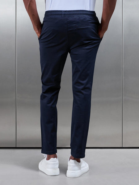 TAILOREDDRAWSTRINGCHINOTROUSERINNAVY5_5f60fe90-28a4-4183-ba55-62f03cb6fb5b_600x600.jpg